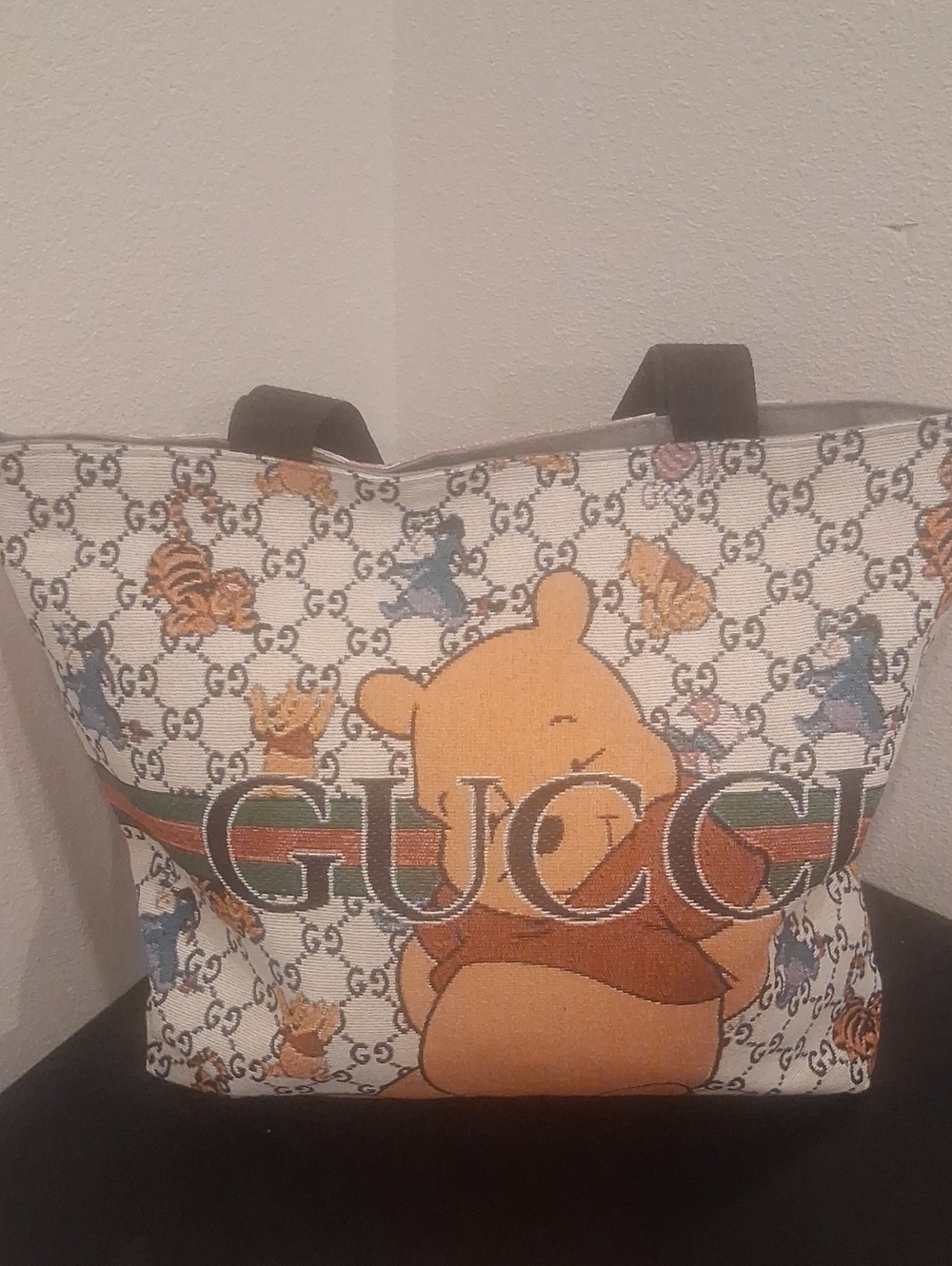 Preowned Canvas Winnie the Pooh Tote with Black Straps and Orange Accents